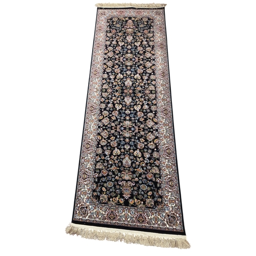 493 - An allover floral pattern deep ground fine woven Iranian Runner.