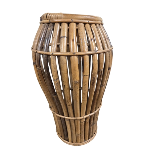 379 - A Bamboo/Wicker stick Stand along with a companion set.