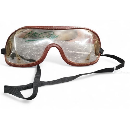 78 - An original pair of Jockeys Goggles signed by Lester Piggott.