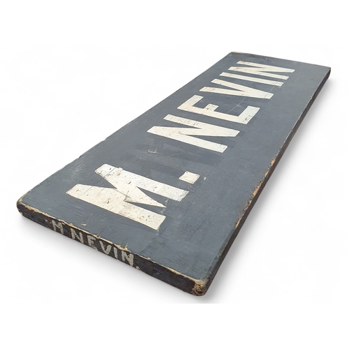 200 - A vintage Timber Jockey Board Sign for M Nevin.
