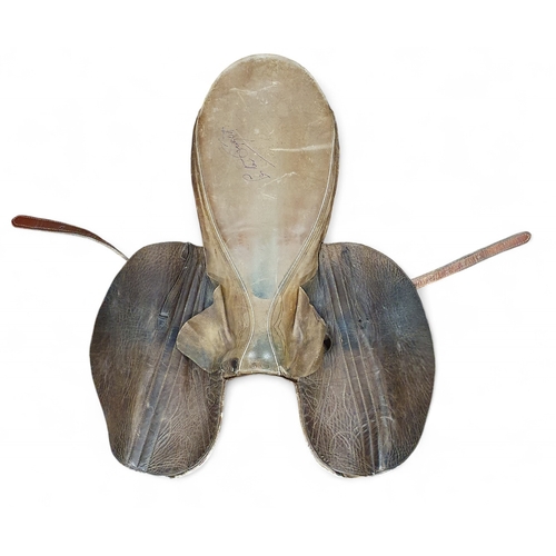 203 - A signed Lester Piggott Leather Racing Saddle, and weighs approx 1.1kg. Comes with a photograph of L... 