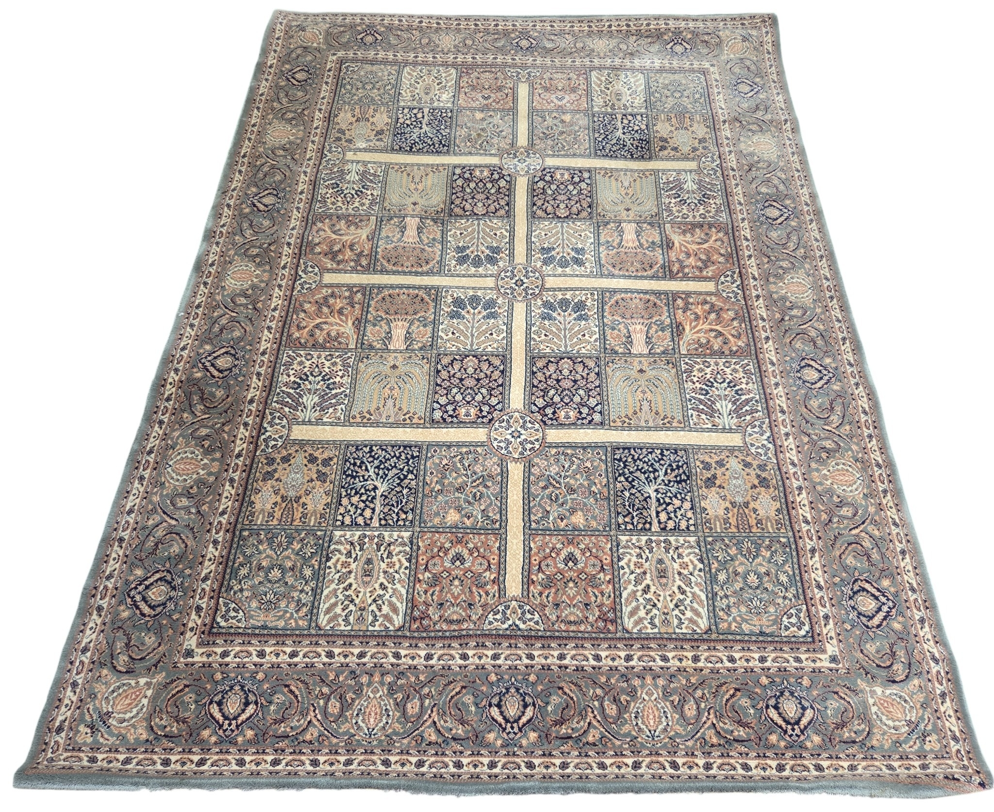A green ground Carpet with Tree of Life decoration. 172 x 240 cm approx.