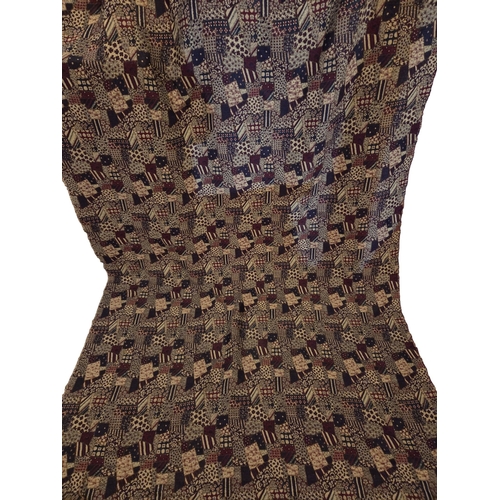 29 - A good Red and Brown ground Throw.