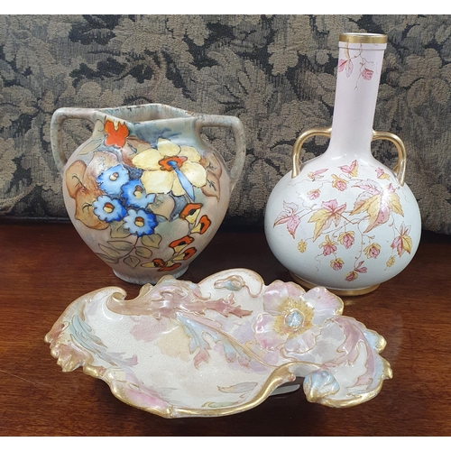 318 - A group of Royal Crown Devon ware to include a bottle vase, another vase and a centre dish. D 14 x H... 
