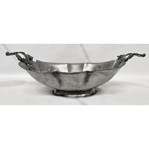 345 - A 19th Century Pewter Centre Dish with floral etching and foundry mark underneath. 40 x 23 cm approx... 