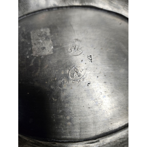 345 - A 19th Century Pewter Centre Dish with floral etching and foundry mark underneath. 40 x 23 cm approx... 