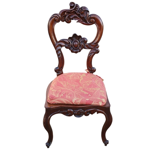 469 - A Pair of 19th Century Walnut Hall Chairs with canework seats along with a foot stool and a piano st... 