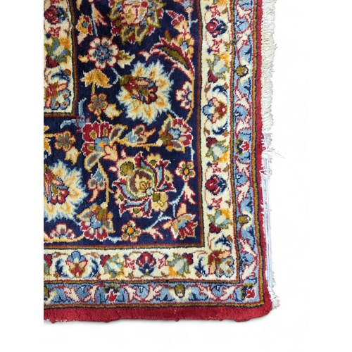 1 - An extremely large Persian Red ground Carpet with unique centre medallion and multi borders. 440 x 3... 