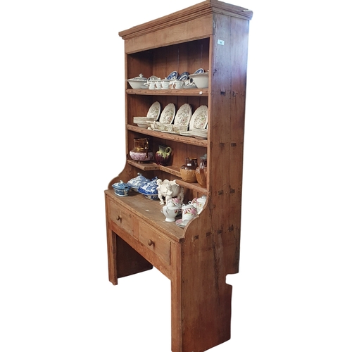 50 - A good 19th Century stripped Pine Dresser. 132 x 43 x H 200 cm approx.