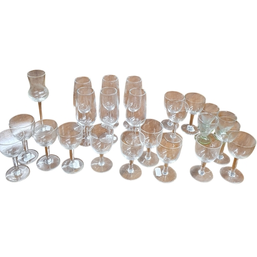 27 - A quantity of Crystal and Glassware to include a quantity of stoneware etc. in three crates.