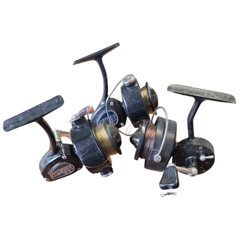 89 - Two Pflueger 33 spinning Reels along with a Mitchell 3-0-4 reel.
