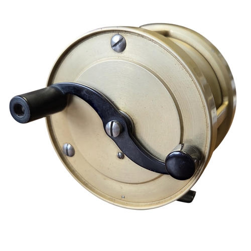 92 - An S.E. Bogdan 300 multiplying Salmon fly reel, gold anodised, right hand wind model with black anod... 