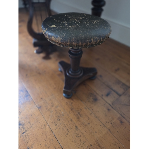 109 - An early Regency Mahogany rise and fall circular Piano Stool. D 39 x H 47 cm approx.
