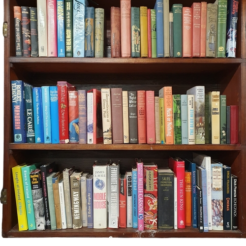 133 - A quantity of Irish and other Books, some first editions, on four shelves.