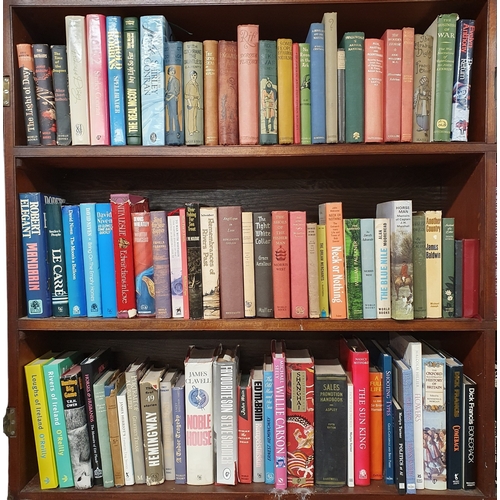 133 - A quantity of Irish and other Books, some first editions, on four shelves.