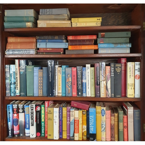 134 - A quantity of Irish and other Books, some first editions, on four shelves.