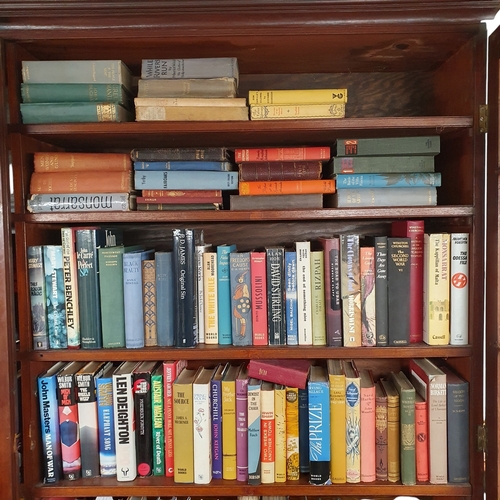 134 - A quantity of Irish and other Books, some first editions, on four shelves.