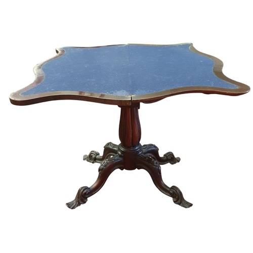 246 - A William IV Rosewood and Veneered foldover Card Table on reeded tulip supports and quatrefoil base.... 