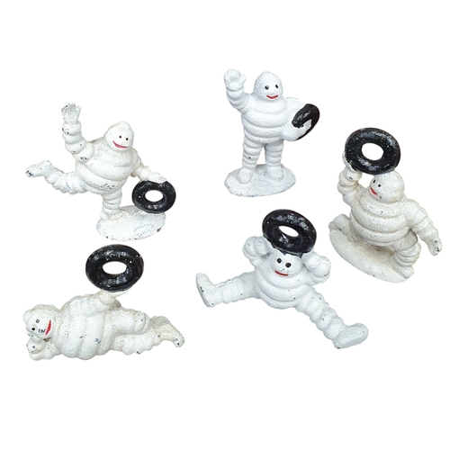 197 - A group of five miniature Michelin Men. TB 8 cm approx.