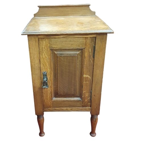 213 - An early 20th Century Oak Side Cabinet with single door on turned supports.  W 43 x D 38 x H 71 cm a... 