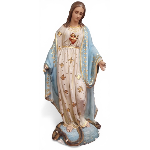 207 - A large hand painted Statue of The Virgin Mary. With faults. H 114 cm approx.