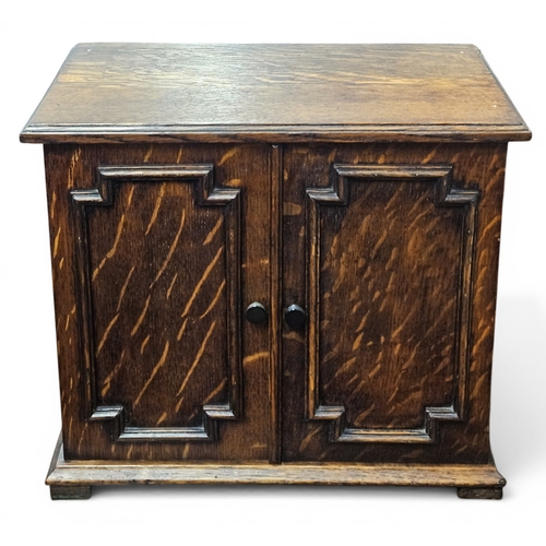 196 - An early 20th Century Oak table top Cabinet. W 36 x D 21 x H 30 cm approx.