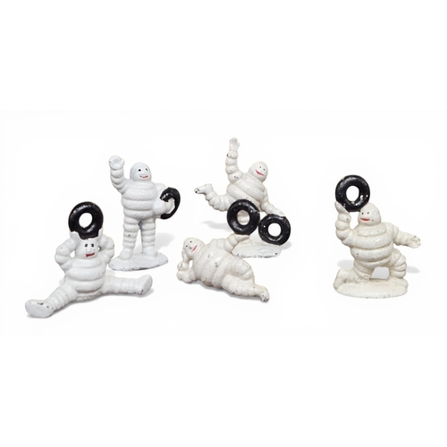 197 - A group of five miniature Michelin Men. TB 8 cm approx.
