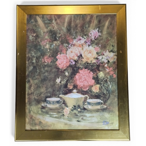 216 - A large colour Print of roses on a table setting. 82 x 67 cm approx.