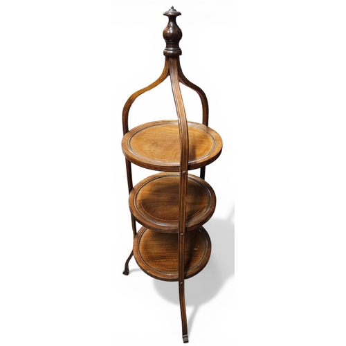 229 - An Edwardian Mahogany three tier Cake Stand. H 91 cm approx.