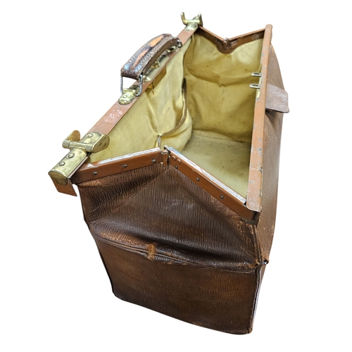 238 - A good 19th Century Doctors Leather Surgical Bag with unusual opening mechanism. L 43 cm approx.