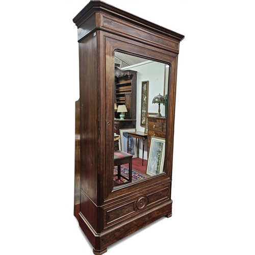 437 - A 19th Century Rosewood and Veneered single door Wardrobe with shelf interior and single frieze draw... 