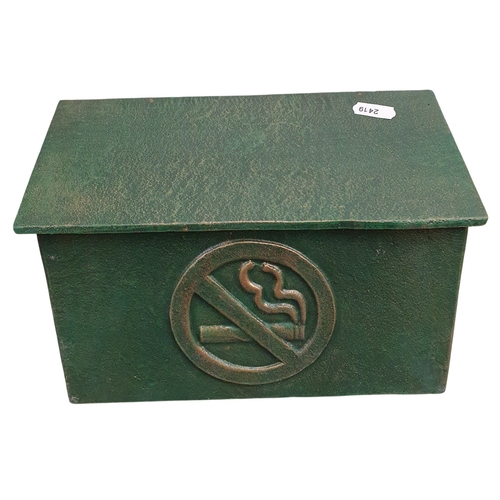 449 - An unusual Cast Iron wall mounted Cigarette Box  with lift up lid. W 24 x H 16 cm approx.