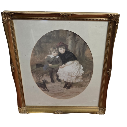 450A - A good coloured Print of children in a good gilt frame. 57 x 46 cm approx.