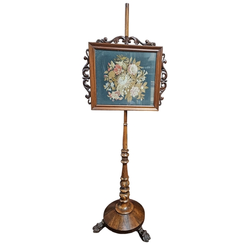 226 - A William the Fourth Rosewood Pole Screen with Tapestry panel centre, on pedestal support and hairy ... 
