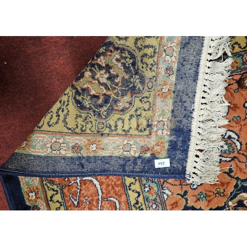254 - A good Persian Blue ground Carpet, Arabic lettering border and central medallion design. 320 x 203 c... 