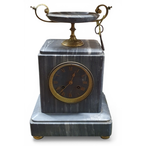 8 - A good 19th Century Marble Mantel Clock with grey marble outline ormolu brass and bezel on turned or... 