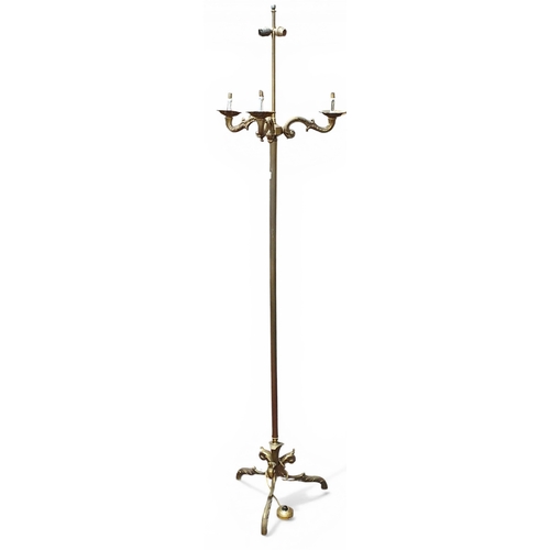 96 - A 20th Century Standard Lamp with reeded and tripod support. H 148 cm approx.