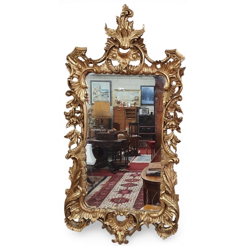 95 - An early to mid 20th Century Timber and Plaster Gilt Irish Mirror in the Chinese Chippendale style.
... 