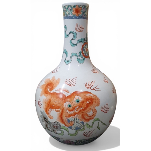 47 - A good late 19th early 20th Century Oriental Vase with hand painted Dogs of Foo. H 33 cm approx.