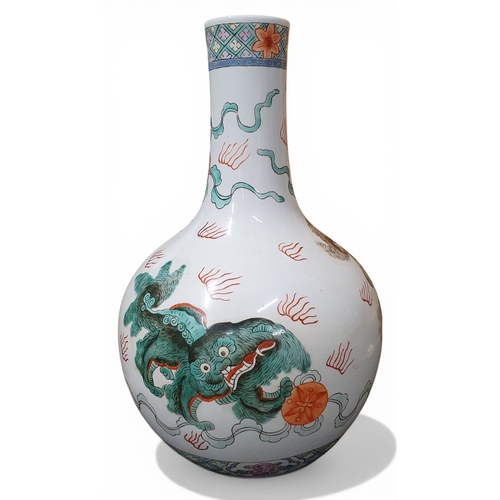 47 - A good late 19th early 20th Century Oriental Vase with hand painted Dogs of Foo. H 33 cm approx.