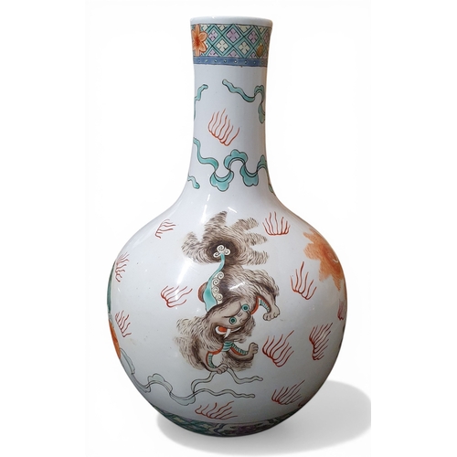 47 - A good late 19th early 20th Century Oriental Vase with hand painted Dogs of Foo. H 33 cm approx.