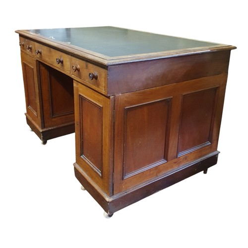 43 - A 19th Century Mahogany Pedestal Desk with triple frieze drawer and panel door base. W 122x 81 x H 7... 