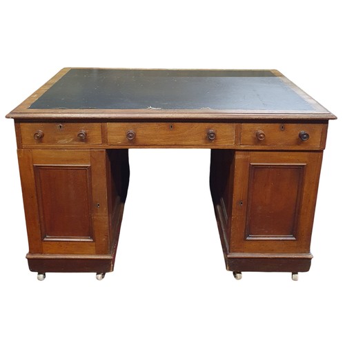 43 - A 19th Century Mahogany Pedestal Desk with triple frieze drawer and panel door base. W 122x 81 x H 7... 