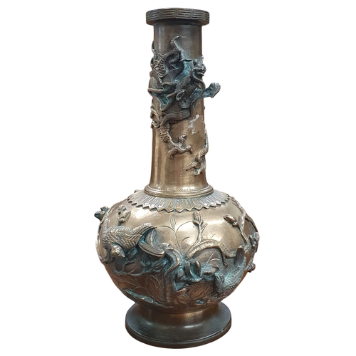 20 - A good Oriental Bronze Vase with highly moulded outline depicting birds of paradise on branches. H 2... 