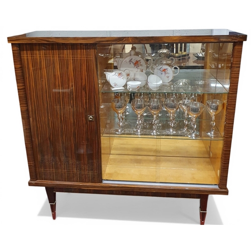 18 - A fantastic Retro Rosewood three door Display Cabinet with twin glazed sliding doors beside single p... 