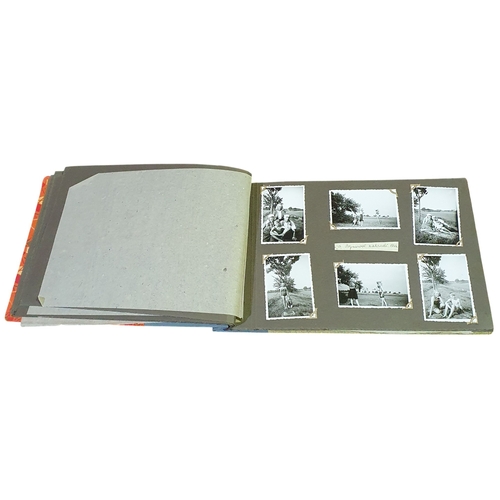 5 - A Box of assorted fabrics, a photo album from 1944, selection of Vinyl records and dress making prin... 