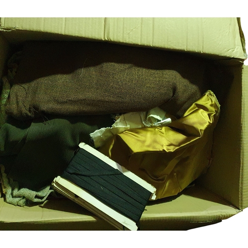 5 - A Box of assorted fabrics, a photo album from 1944, selection of Vinyl records and dress making prin... 