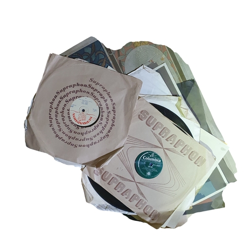 5 - A Box of assorted fabrics, a photo album from 1944, selection of Vinyl records and dress making prin... 