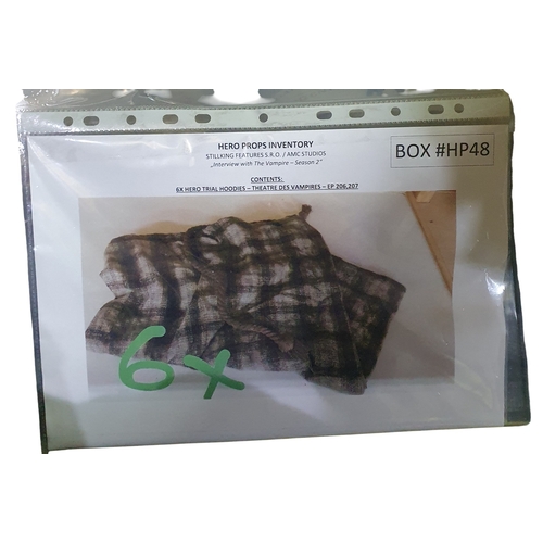 6 - A large black Throw along with a box of assorted Fabrics and Hero Hoodie Bags.