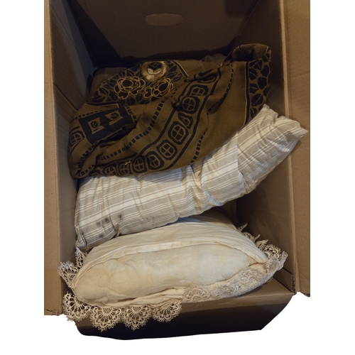 21 - A quantity of Cushions and Leather Bindings in three boxes.